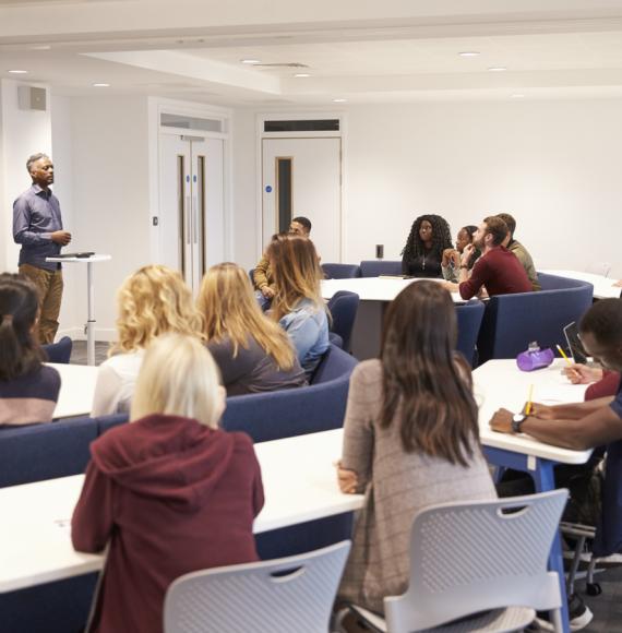 Learners listening to a seminar