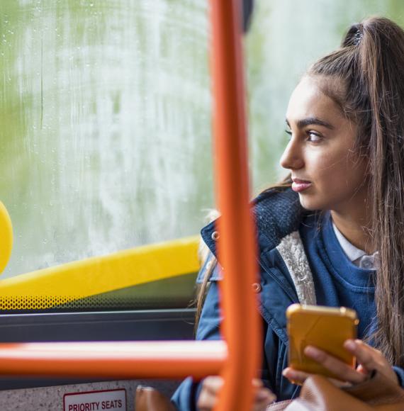 teenage girl commuting to school