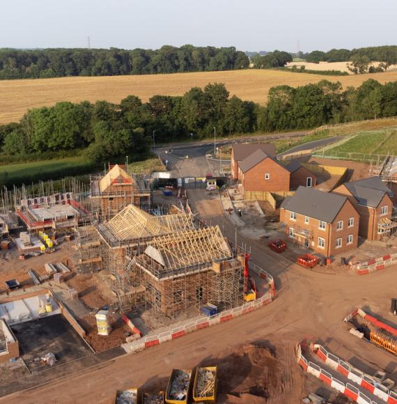 Aerial view of new build housing construction site in England, UK