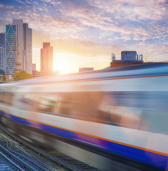 London Overground with the City of London skyscrapers in the background