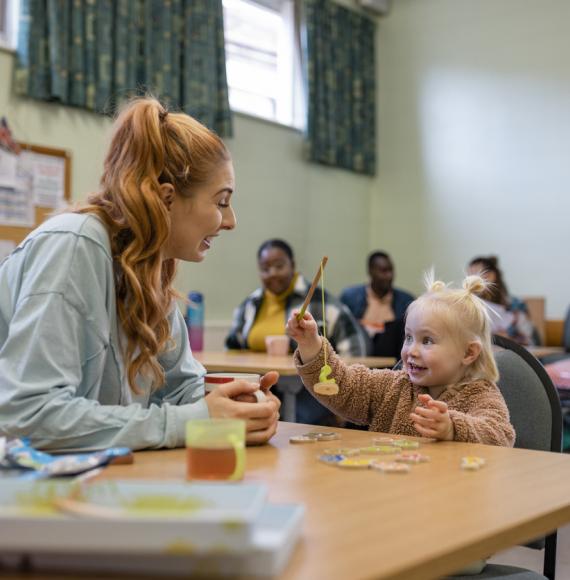 Mother and young girl relying on youth services