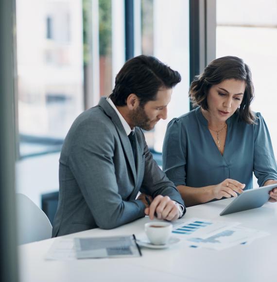 Two people in a business meeting