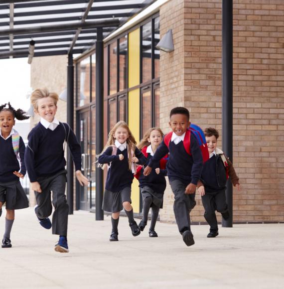 Children running in a school