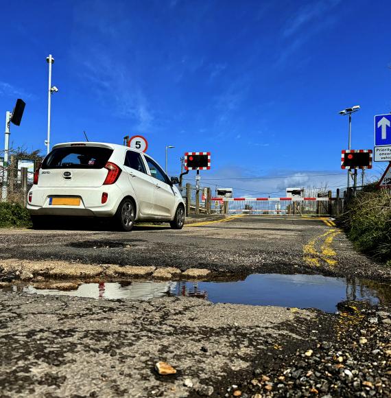 Water-filled potholes in the road