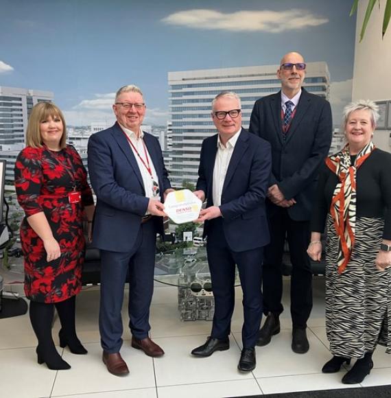 Mayor with staff about the scheme