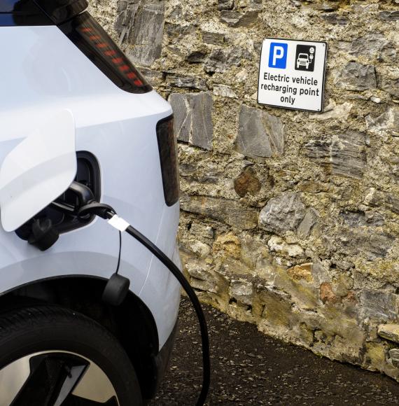 An electric car being recharged