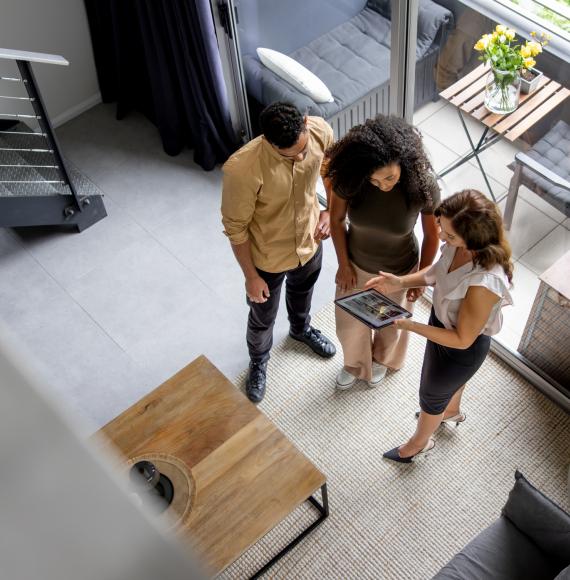 Couple talking to a landlord