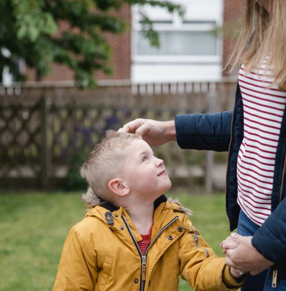 Little boy smiling at his mum