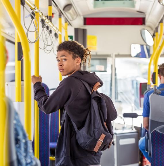 Teenage boy on a bus