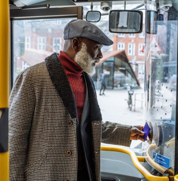 Man getting on a bus