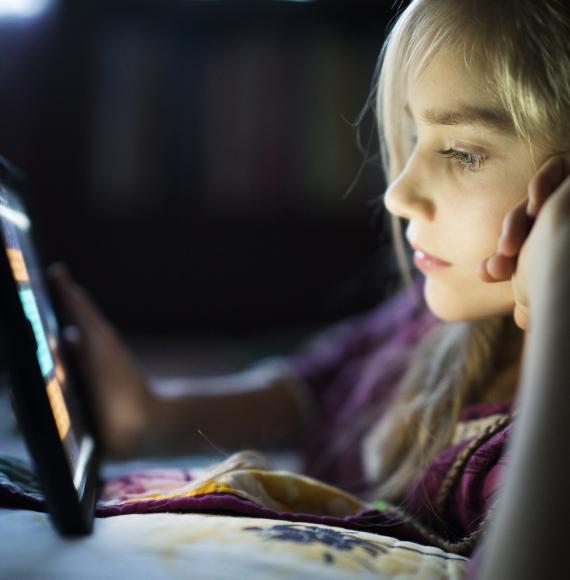 Young person on a tablet