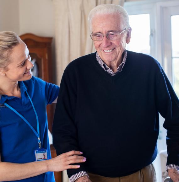 Carer with an elderly gentleman