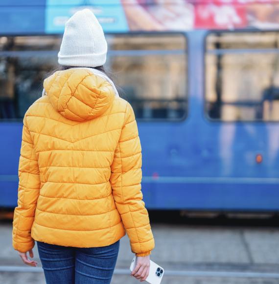 Woman waiting for a bus