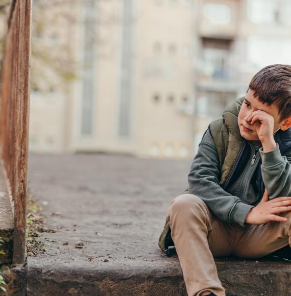 Sad poor child