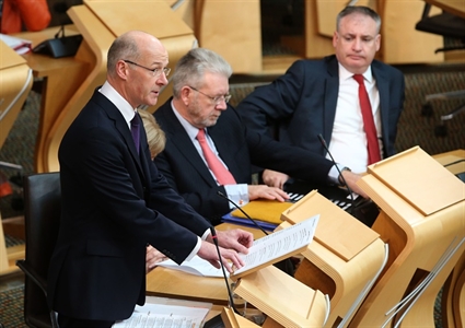 John Swinney c. Andrew Milligan PA Wire